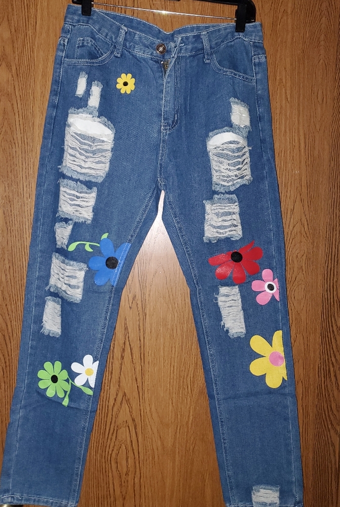 "THE RIPPED JEANS "